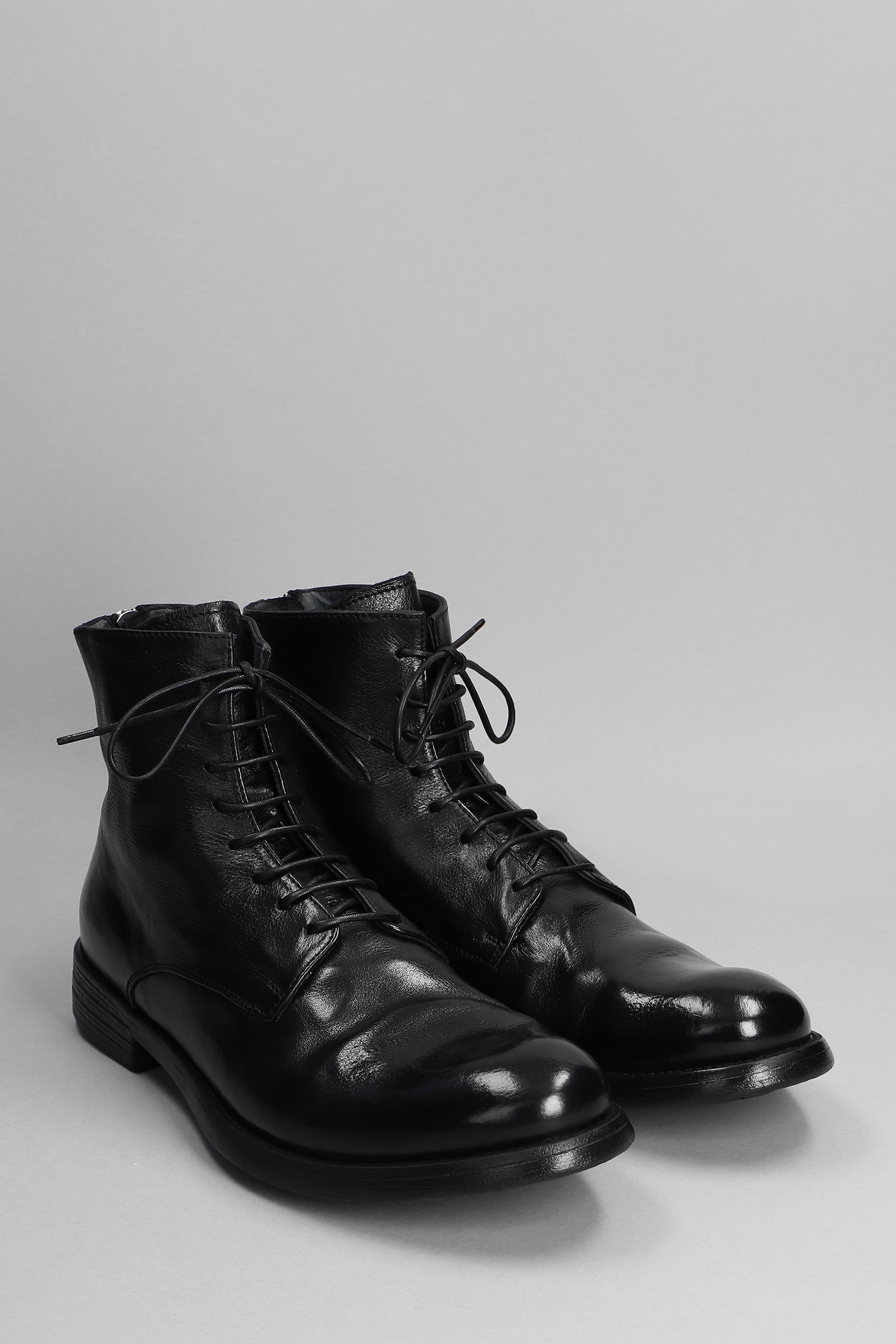Flat lace-up boots