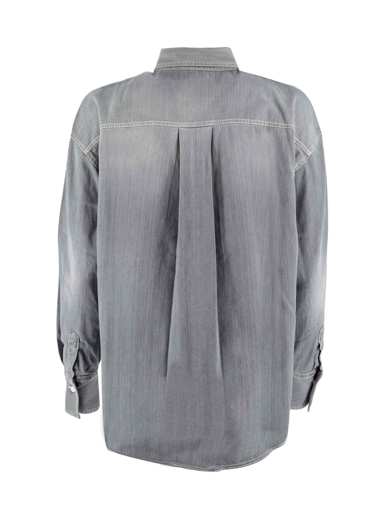 Distressed buttoned denim shirt