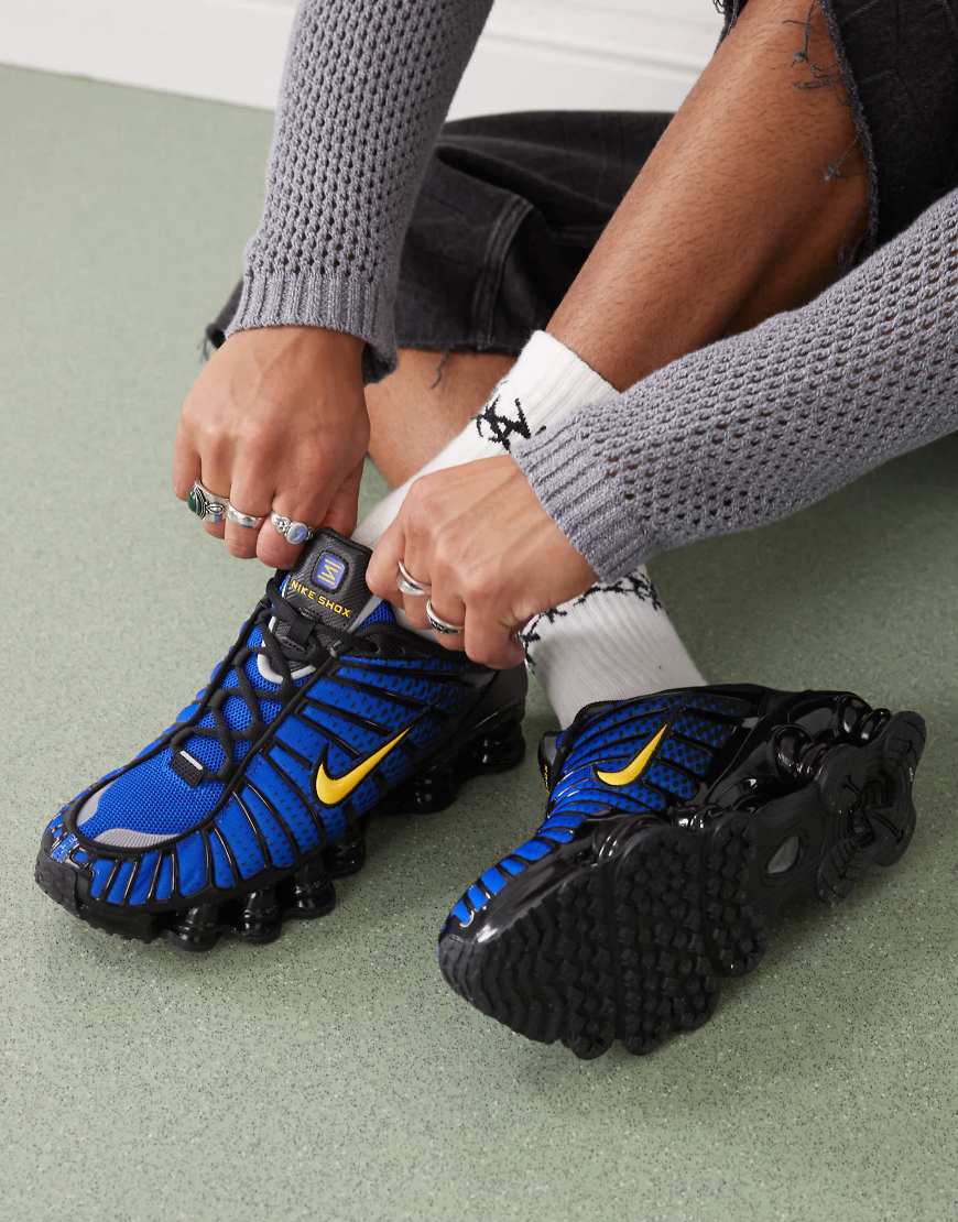 Nike Shox TL sneakers in black and blue