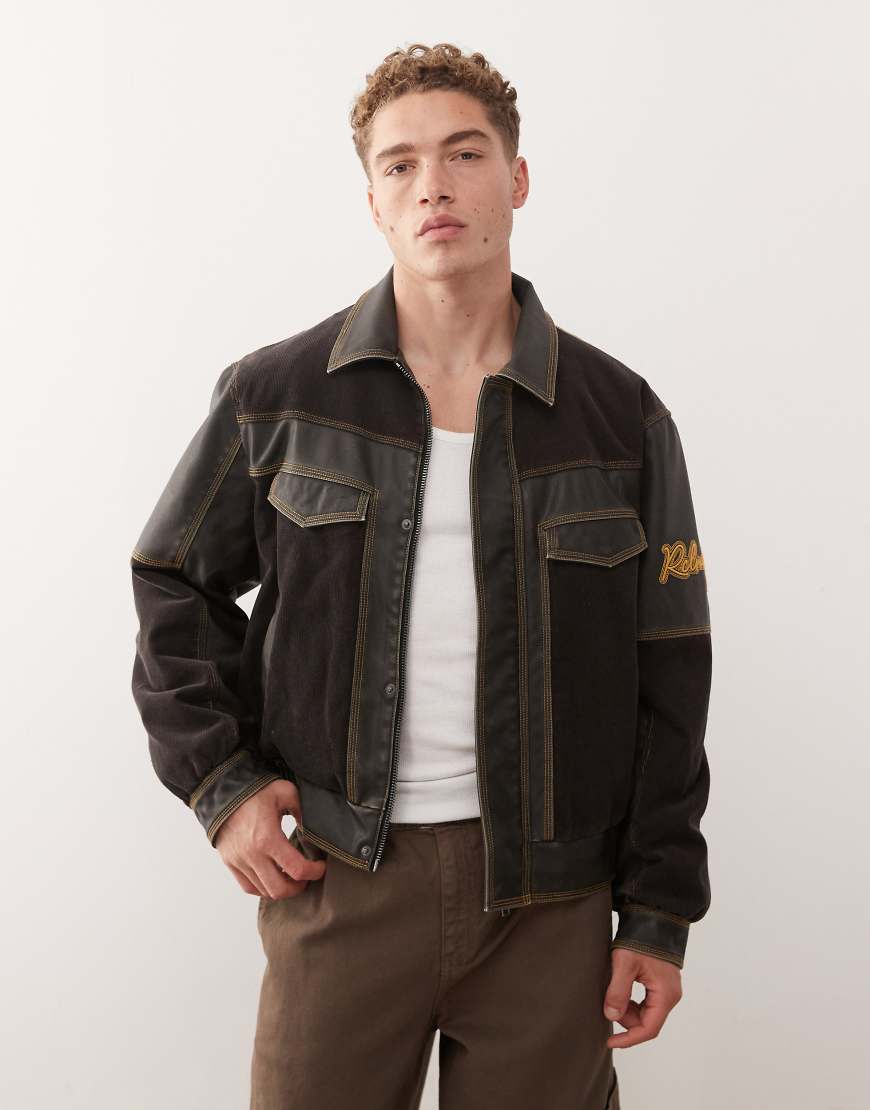 Leather look bomber jacket with contrast cord panels in black