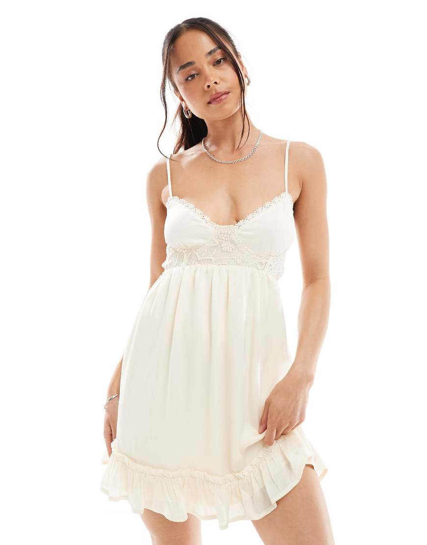 Stradivarius swing mesh detail ruffle trim mini dress in beige-White