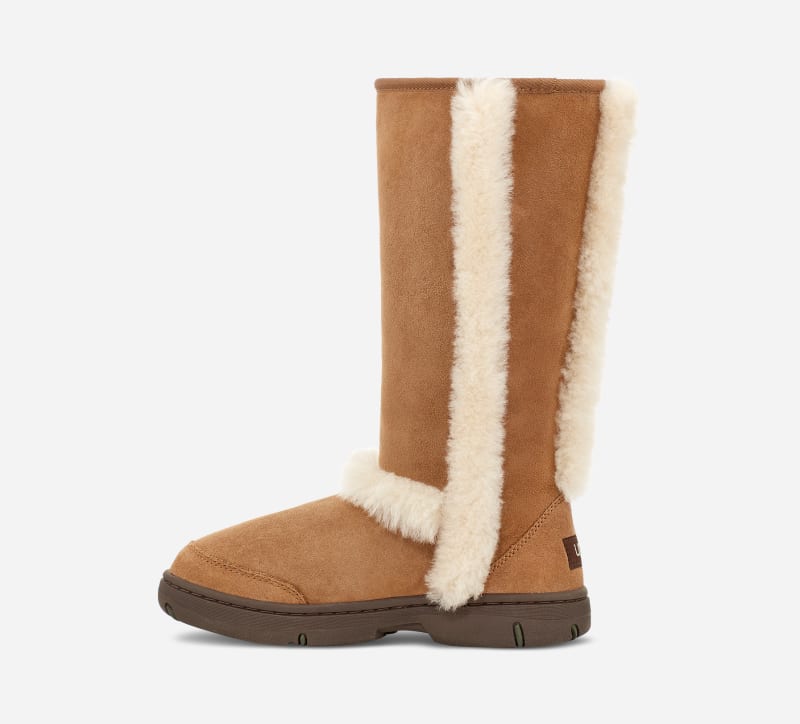 ® Women's Sunburst Tall Warm Sheepskin Boots in Brown/