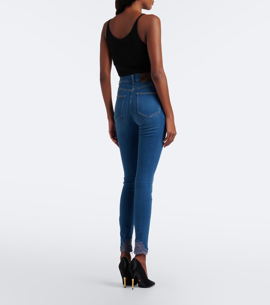 Lace-trimmed skinny jeans