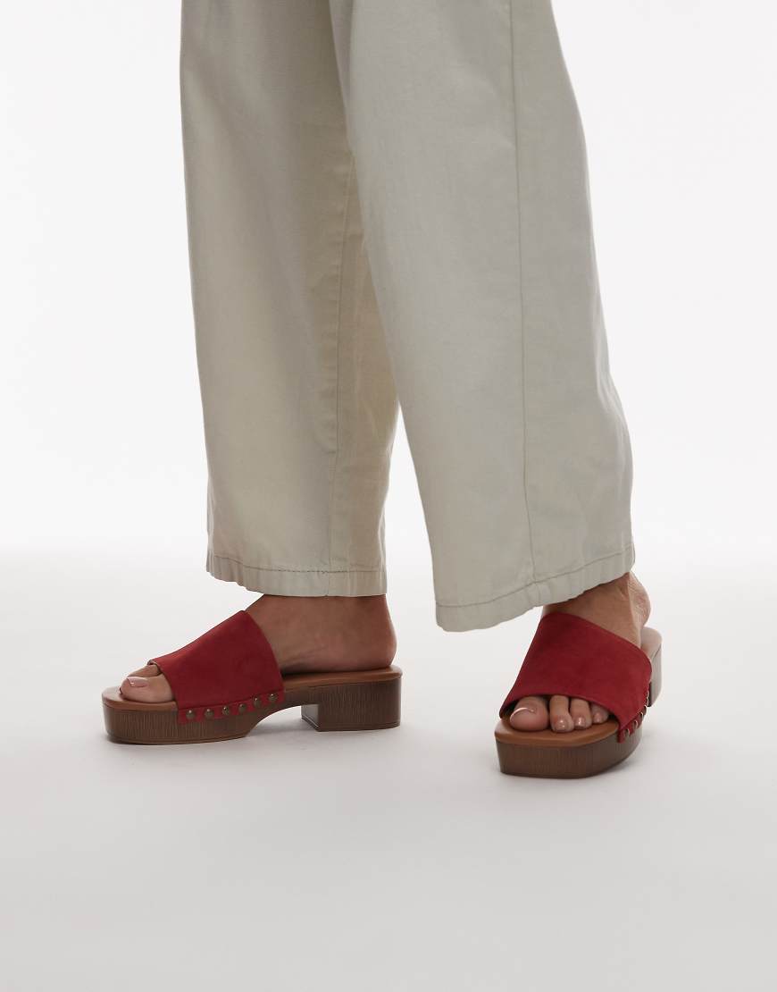 Hamilton suede clogs with studs in red