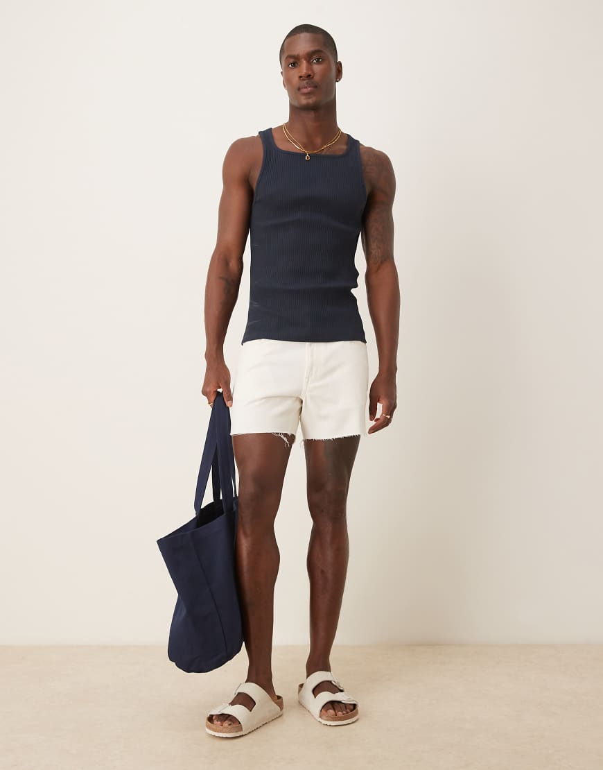 Shorter length slim denim shorts with rip detail in white