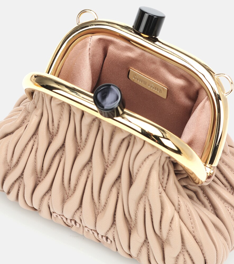 Miu Belle Mini matelassé leather clutch