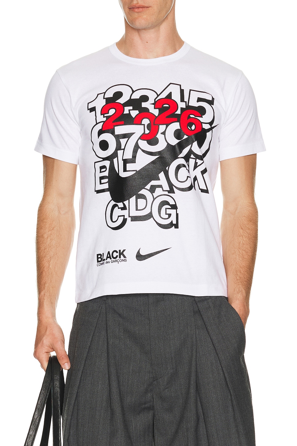 COMME des GARCONS BLACK x Nike Tee in White - White. L also in M, XL/1X