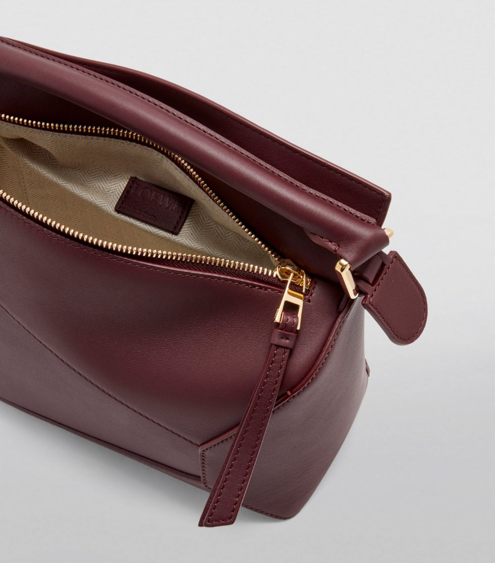Small Leather Puzzle Edge Top-Handle Bag