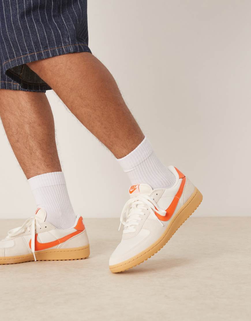 Nike Field General sneakers in off white and orange