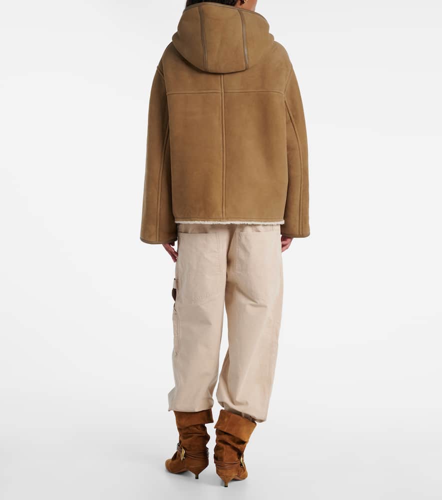 Reversible leather and shearling jacket