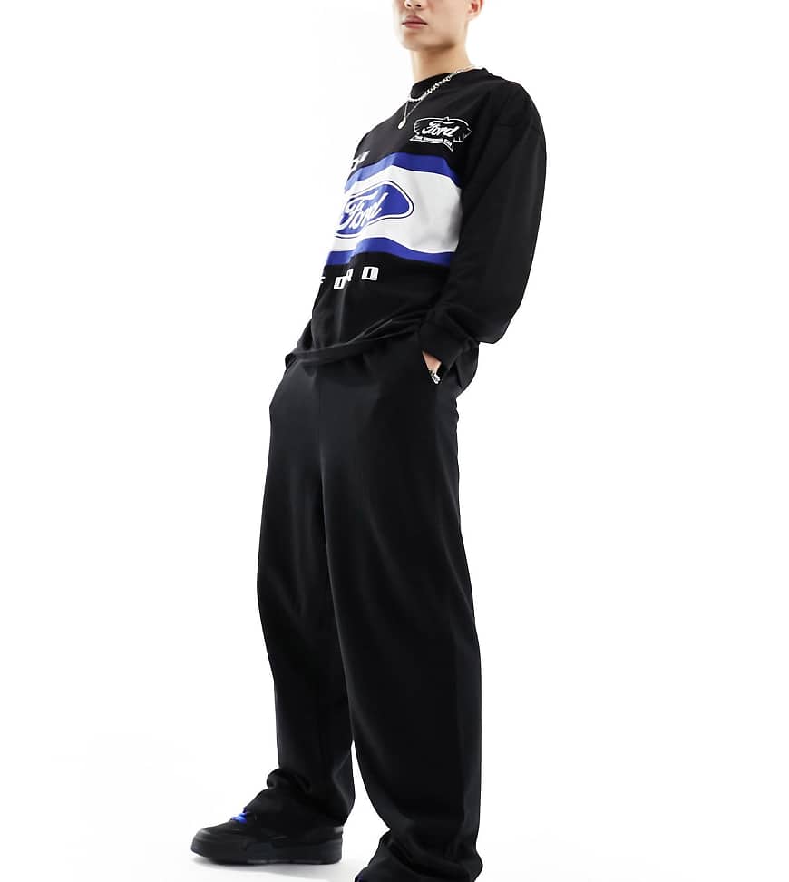 COLLUSION Relaxed skate sweatpants in black