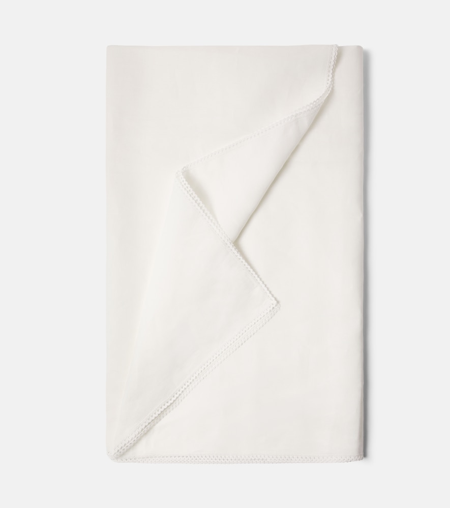 Lace-trimmed tablecloth