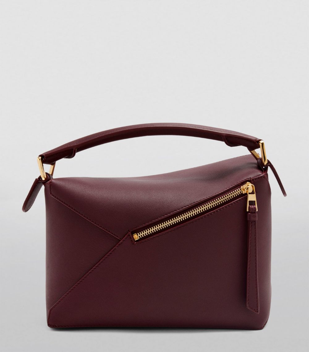 Small Leather Puzzle Edge Top-Handle Bag