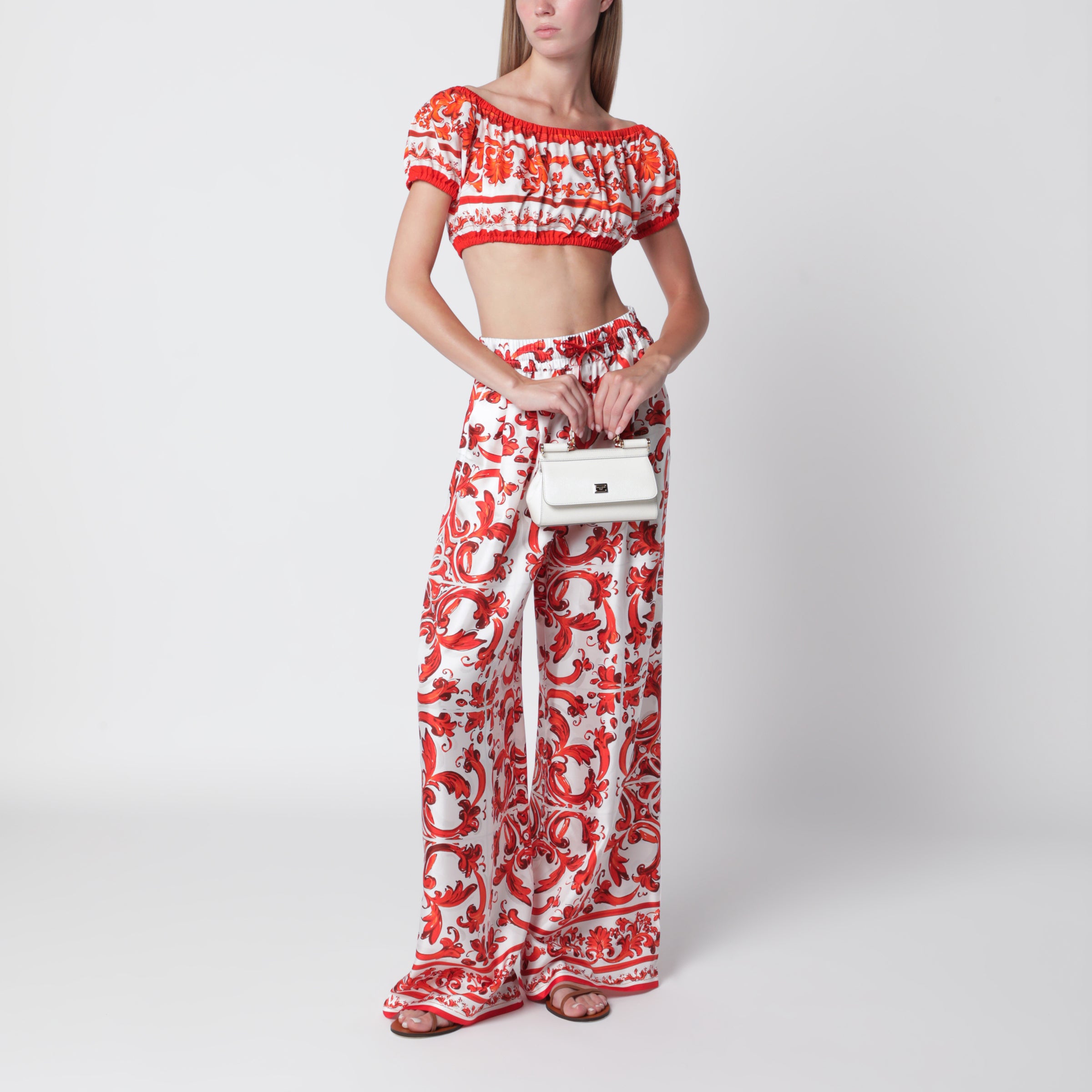 Wide-leg maiolica-print silk pants in orange