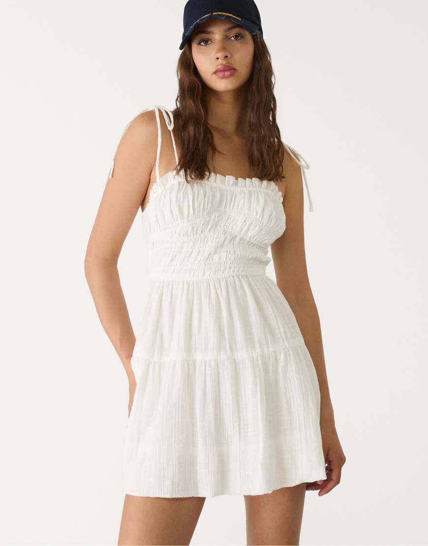 Short balloon dress with elasticated body in ecru-White