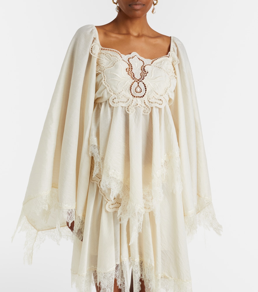 Embroidered lace-trimmed blouse