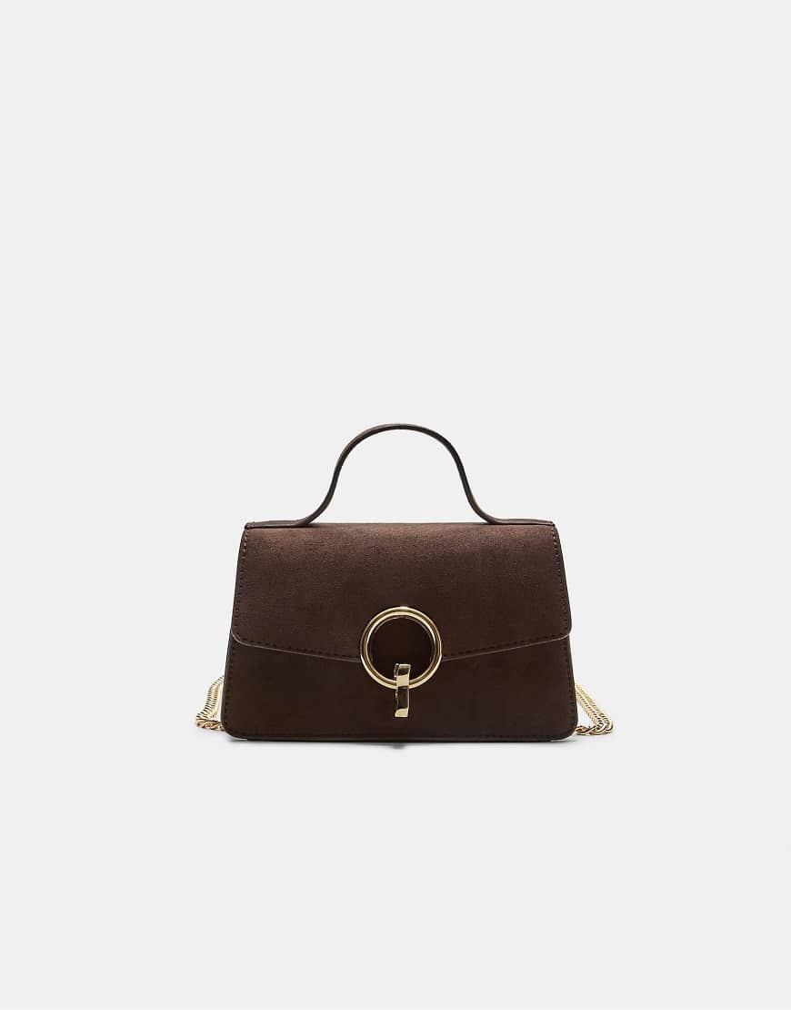 Crossbody bag with a round clasp in brown