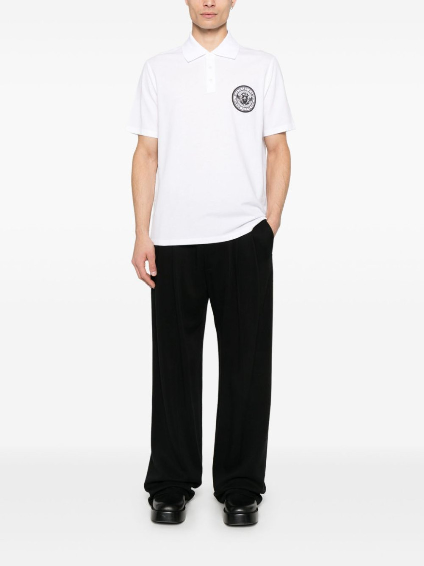 White Polo Shirt With Collar And Coin Print On The Front In Cotton Man