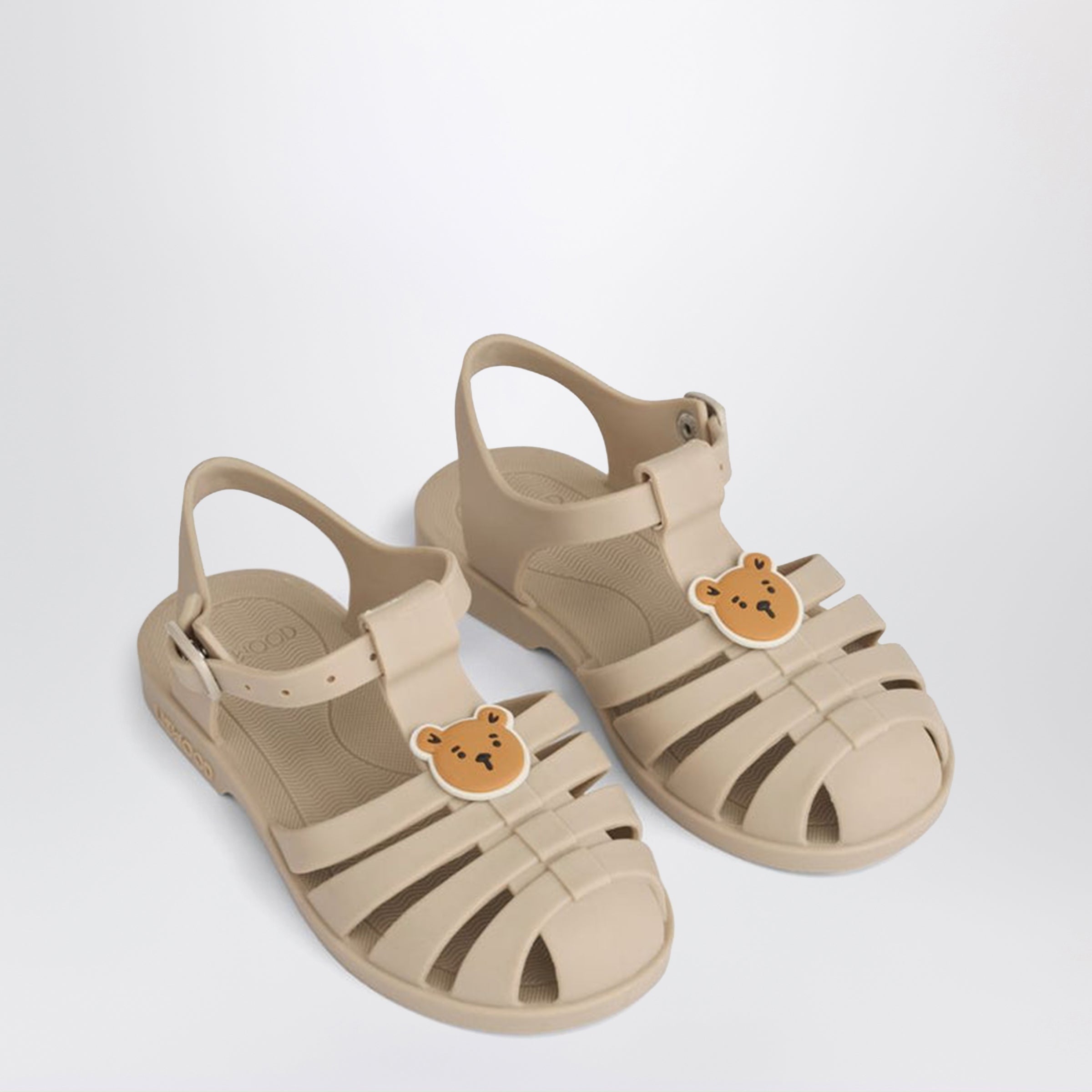 Sand beige Bre sandals with teddy charm