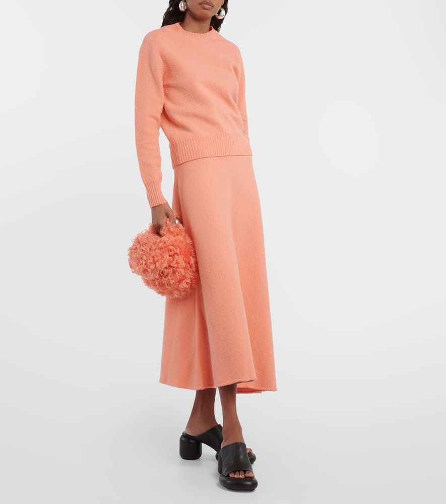 High-rise asymmetric wool midi skirt