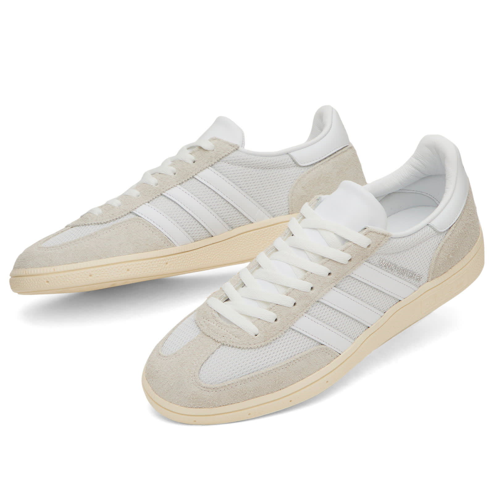 END. x MiG Manchester Sneaker in Ftwr White/Ftwr White/Cream White