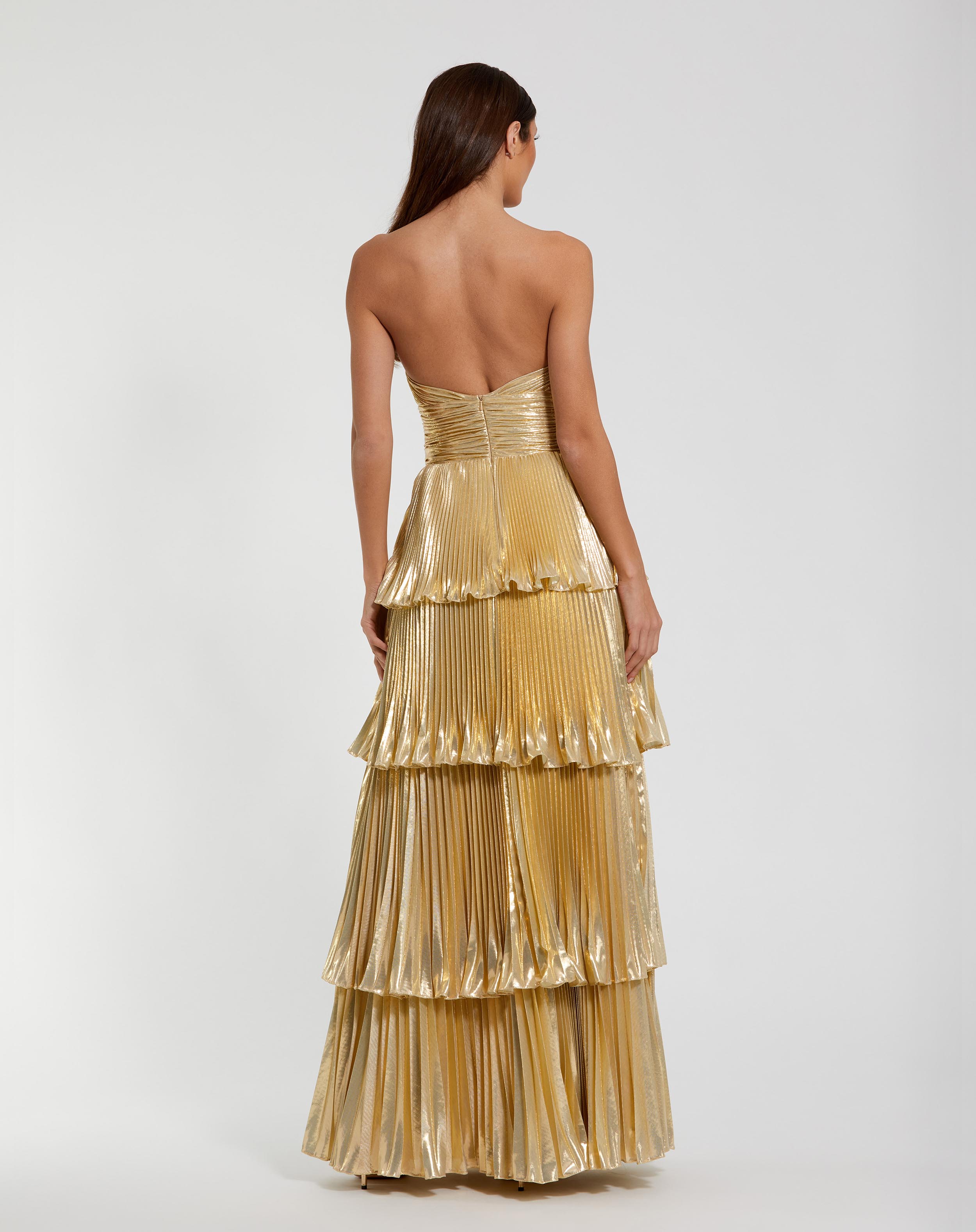Gold Strapless Pleated Metallic Layered High Low Maxi Gown In Gold