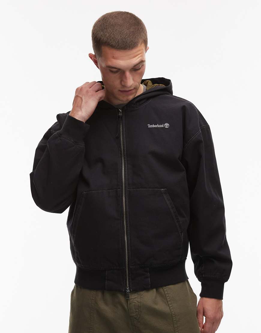 Washed heavy canvas hooded bomber jacket in black