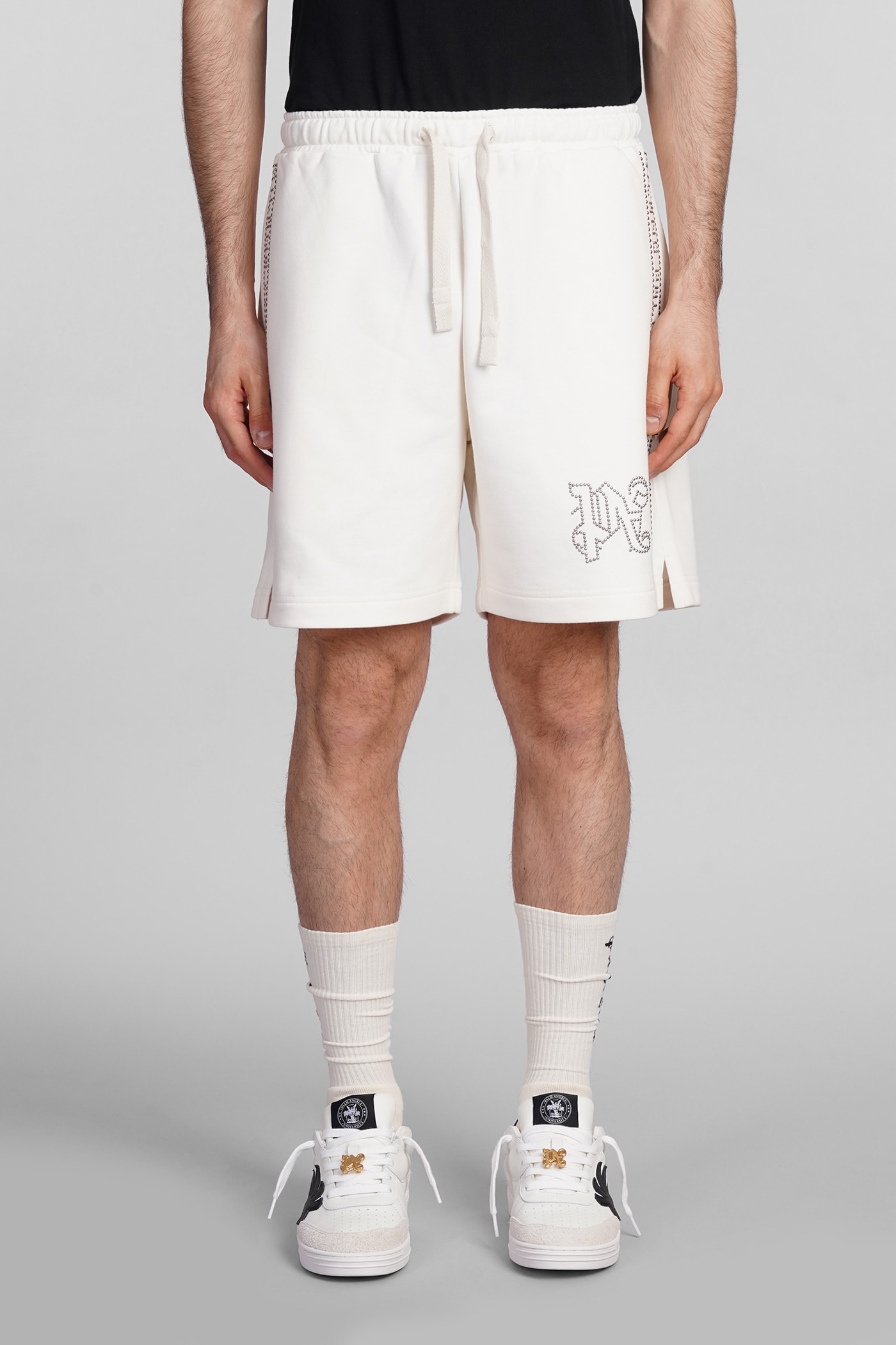 PA monogram-studded shorts - Neutrals