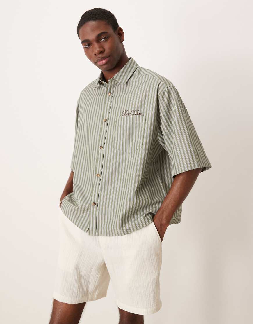 Boxy oversized striped shirt with chest embroidery in green