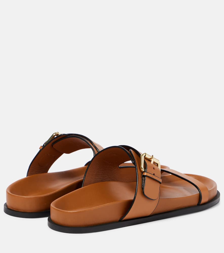 A. Emery Prince leather slides