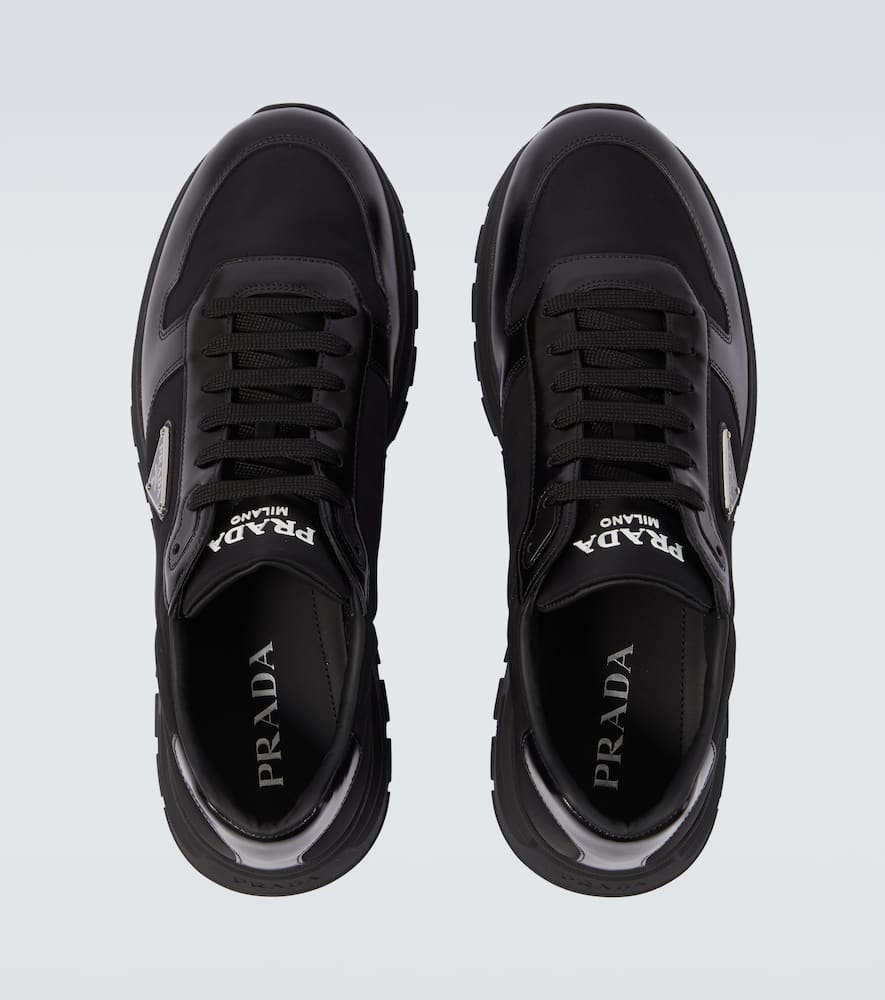 Logo leather-trimmed sneakers