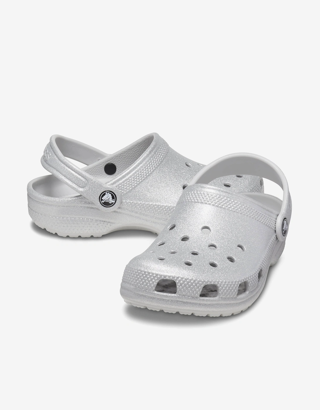Girl's Crocs Girls Classic Glitter Clog in Silver