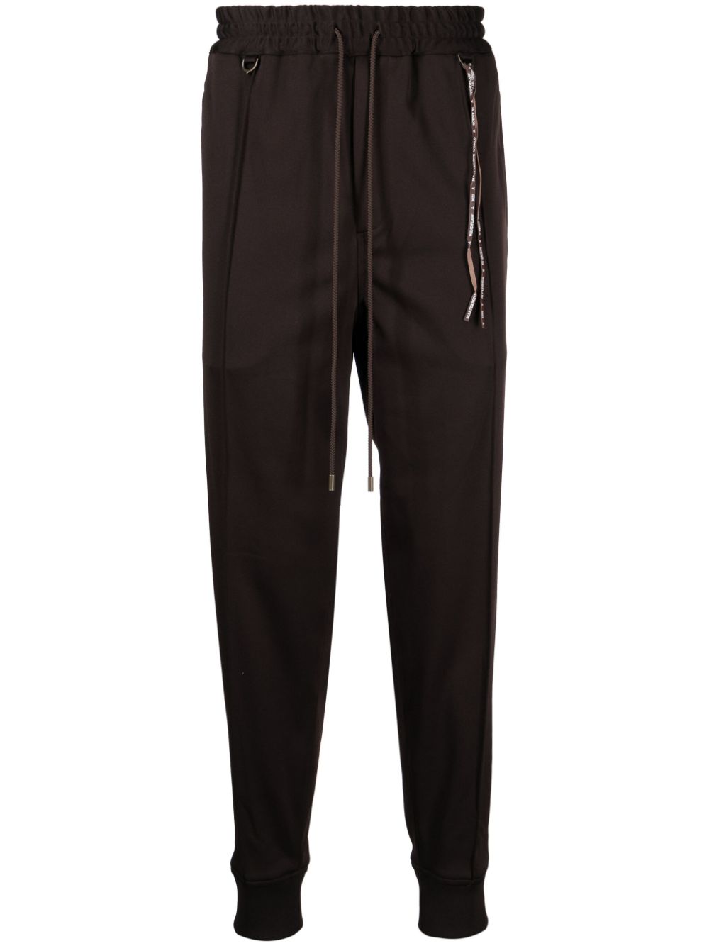 Logo-jacquard tapered track pants - Brown