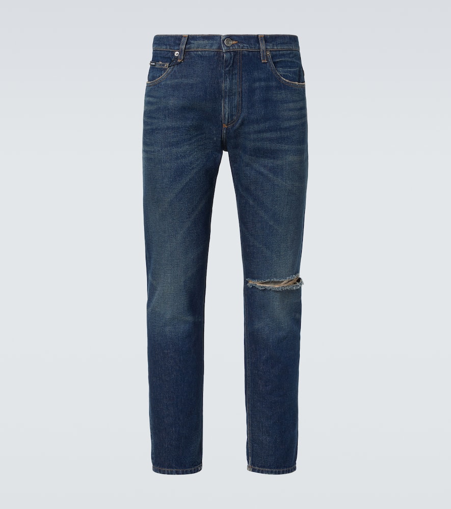 Distressed slim jeans