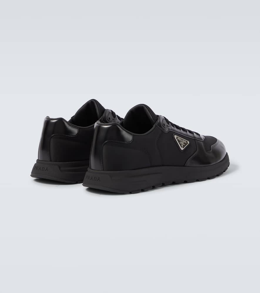 Logo leather-trimmed sneakers