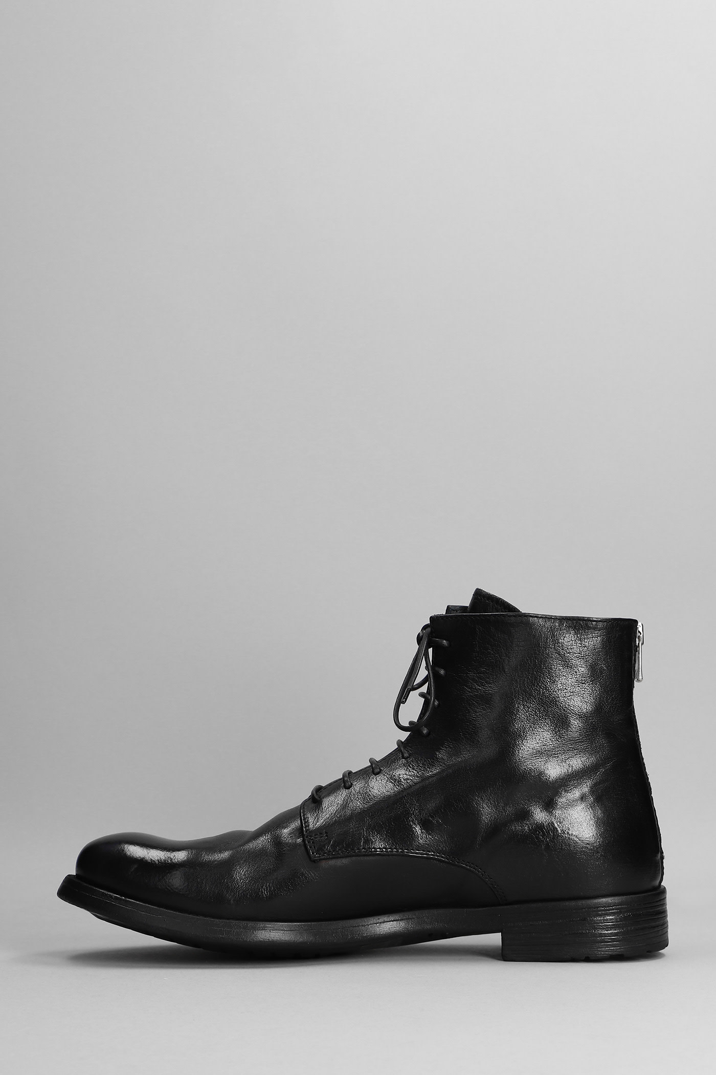 Flat lace-up boots