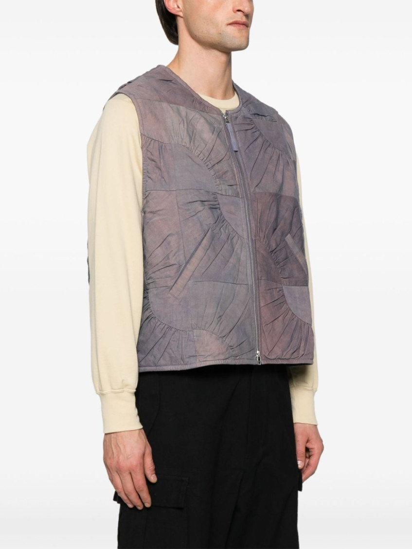 - Pluto Vest