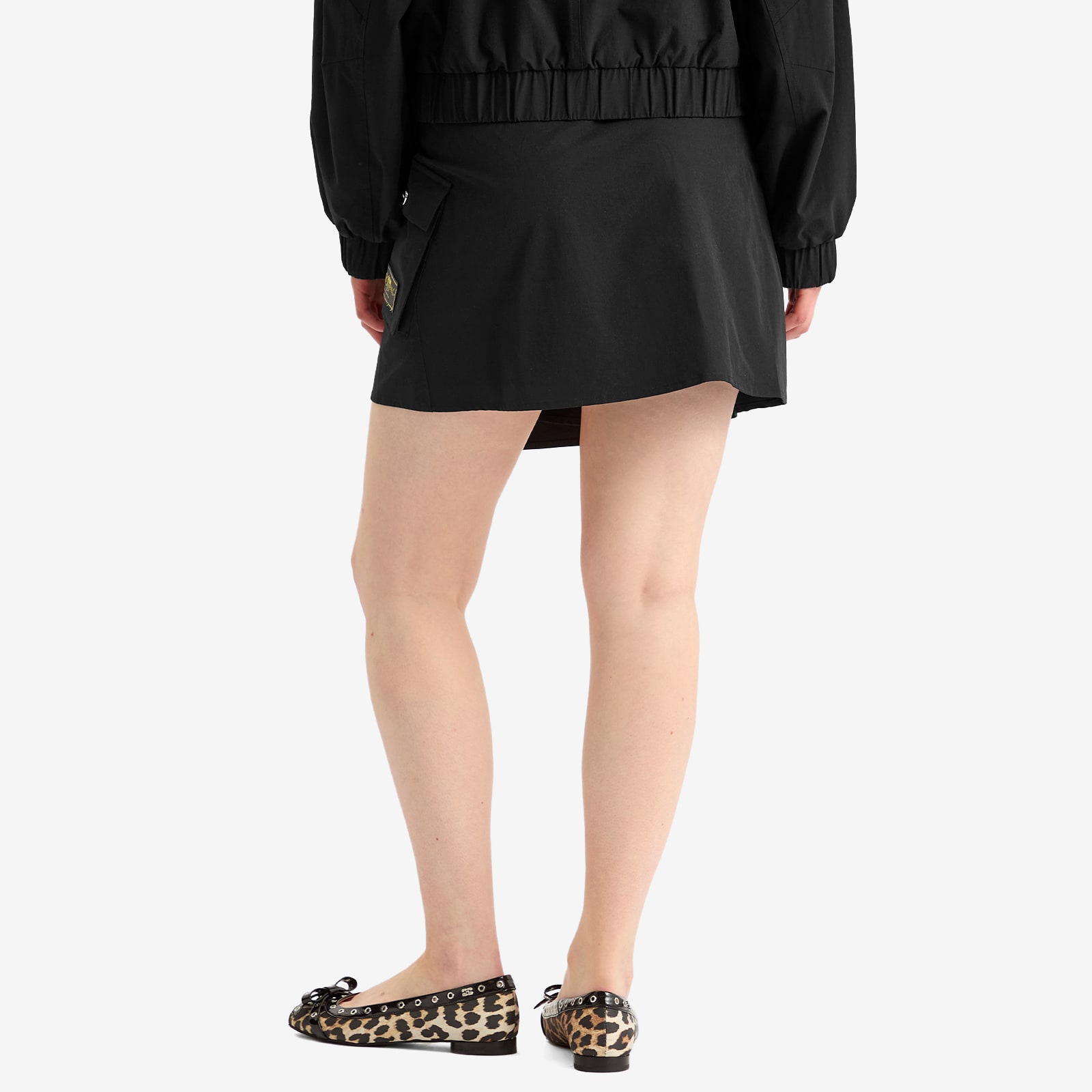GANNI Women's Stretch Shell Wrap Mini Skirt Presented by END. in Black