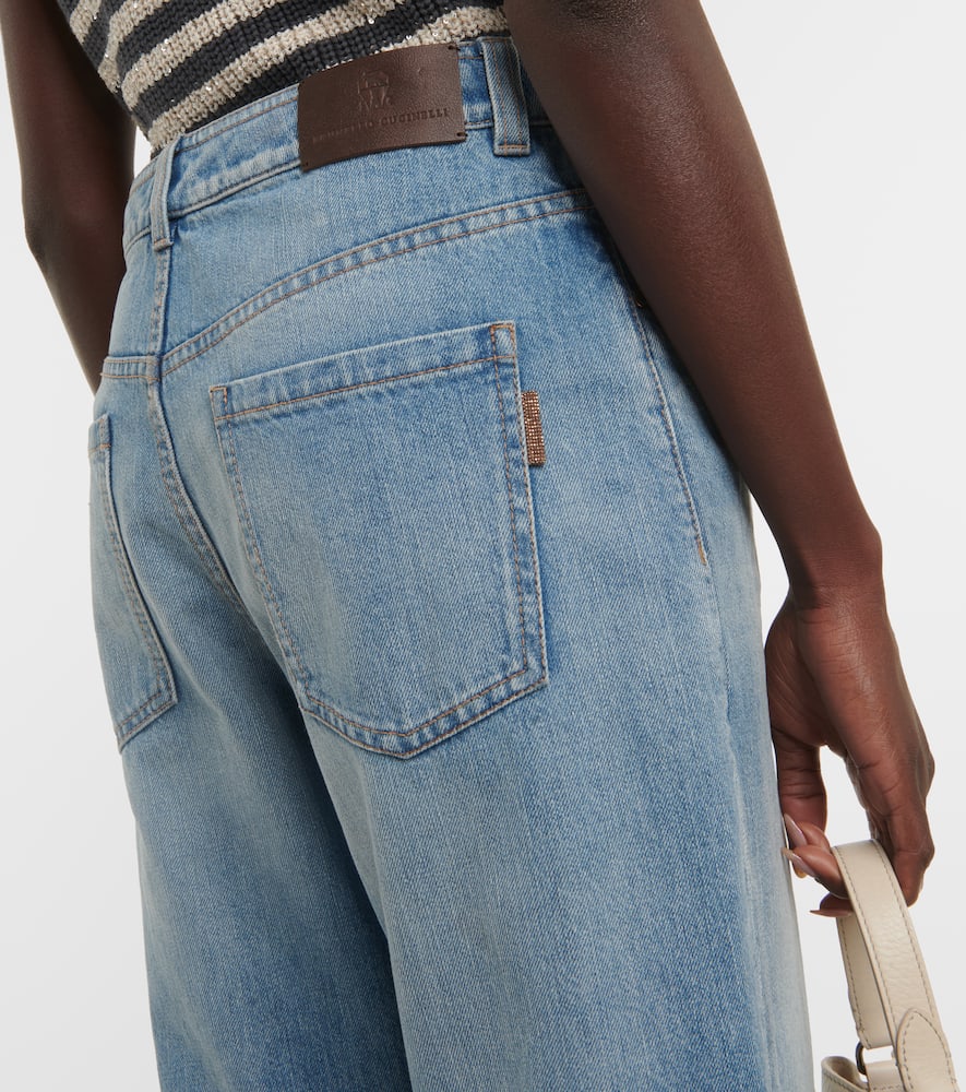 Mid-rise faded tapered jeans