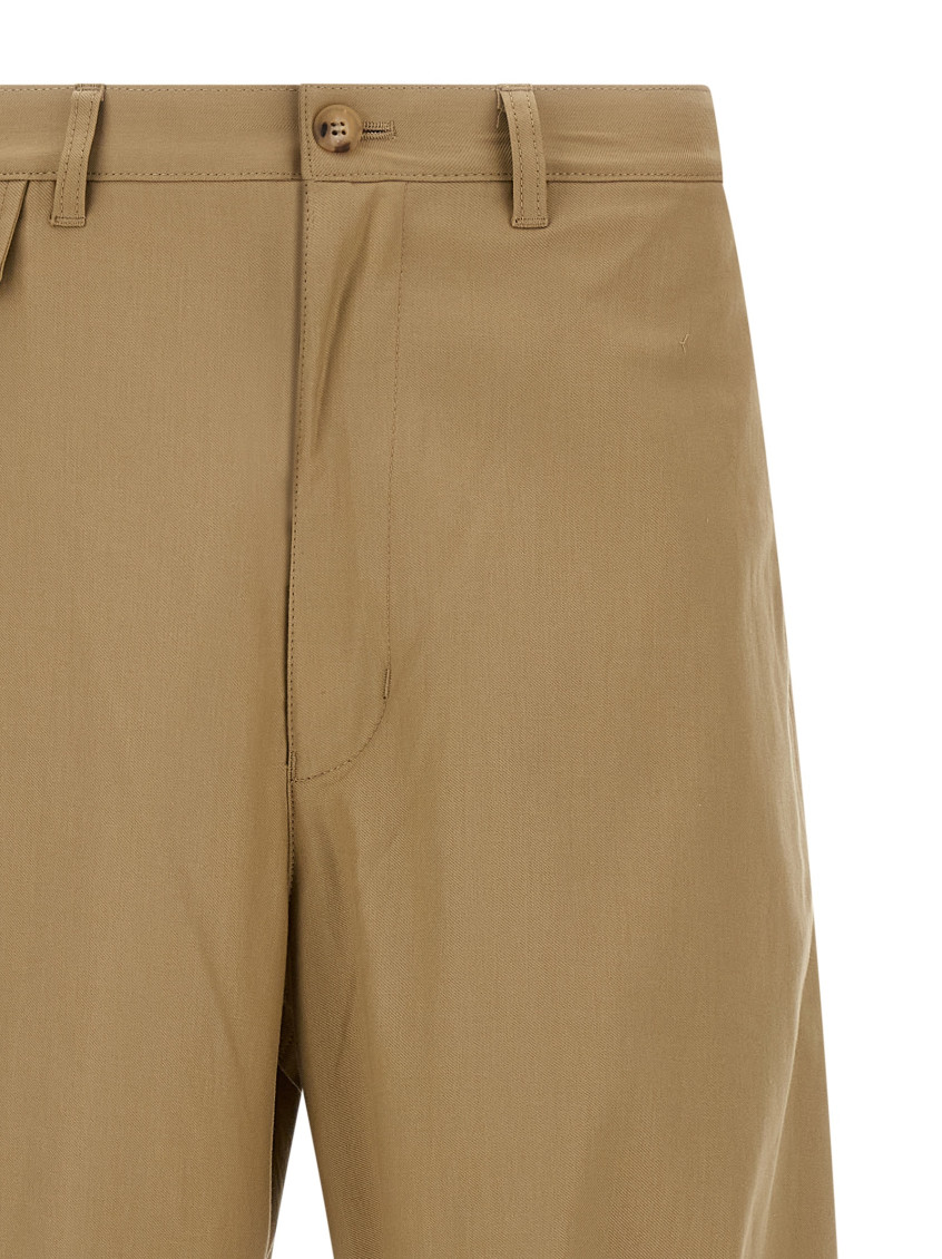 Beige Curved leg pants