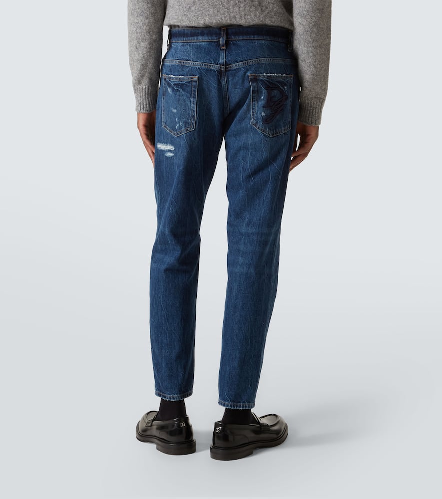 Distressed straight jeans