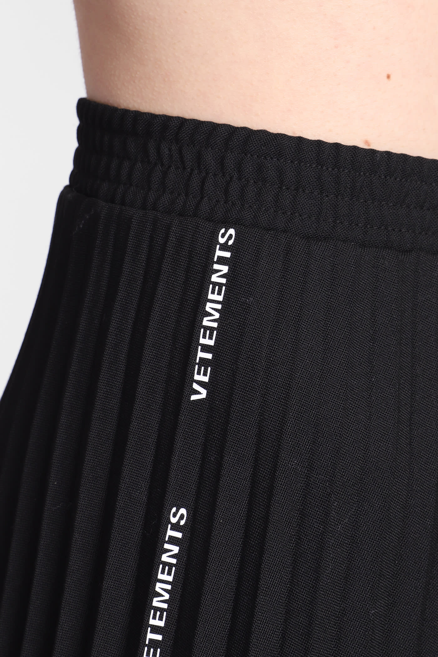 Knee-length pleated skirt - Black