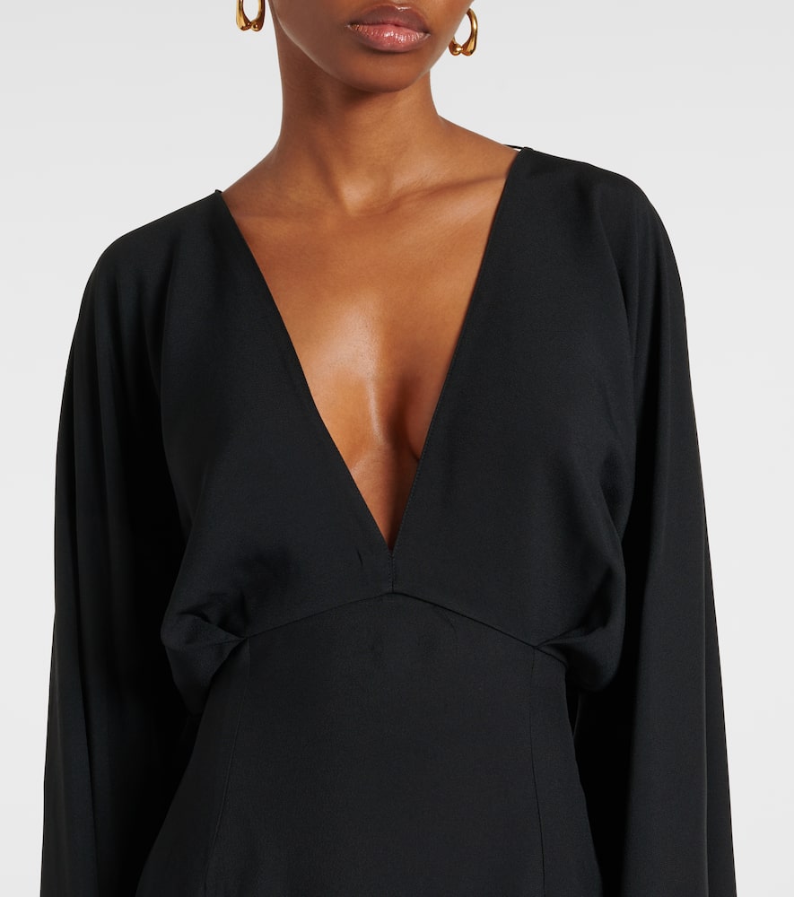Magnifique fringed crêpe gown