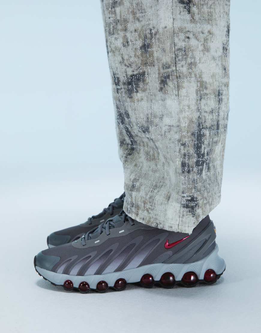 Nike Air Max DN8 sneakers in gray and red