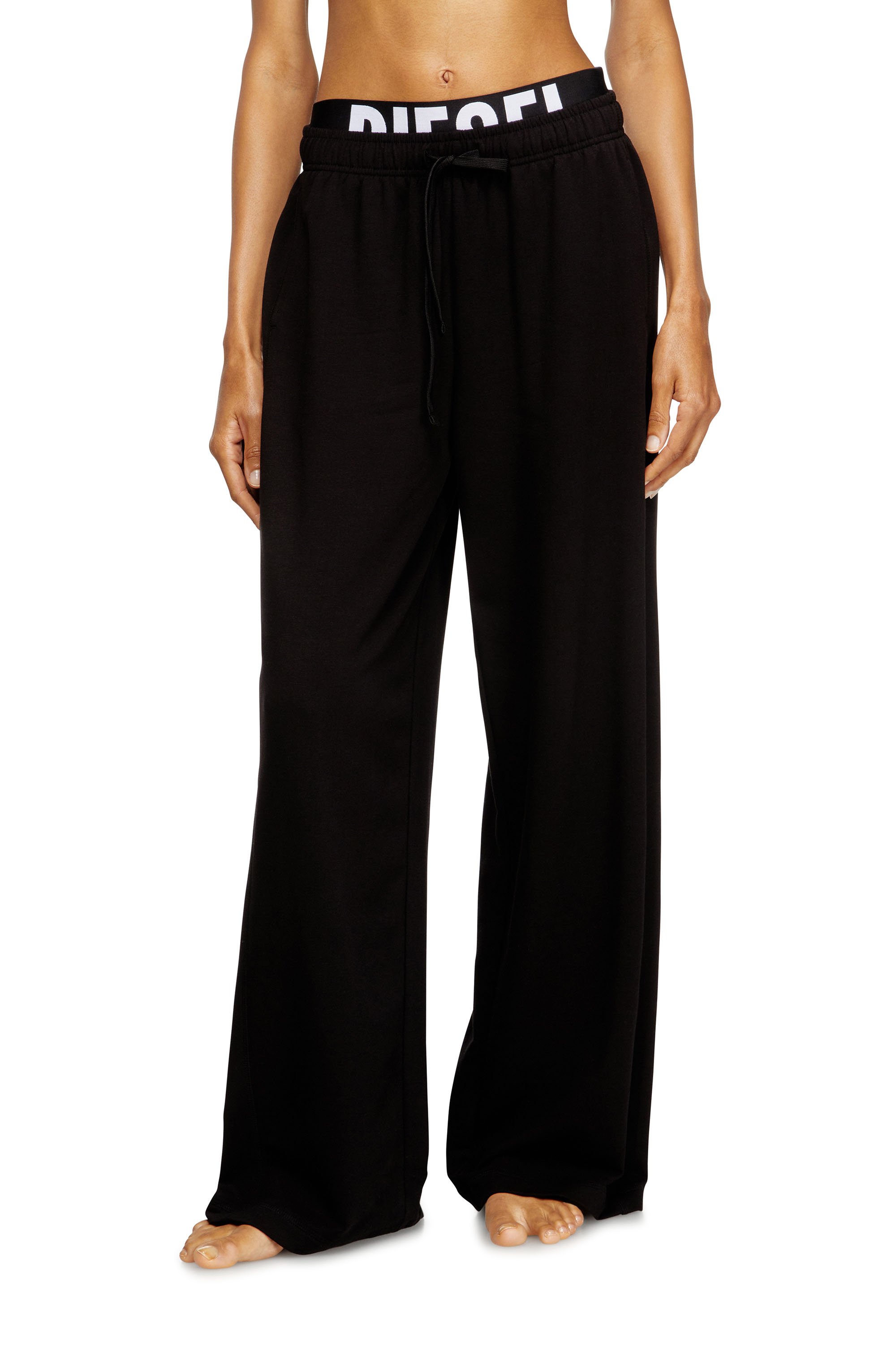Cotton terry sweatpants with logo waistband - Pants - Woman - Black