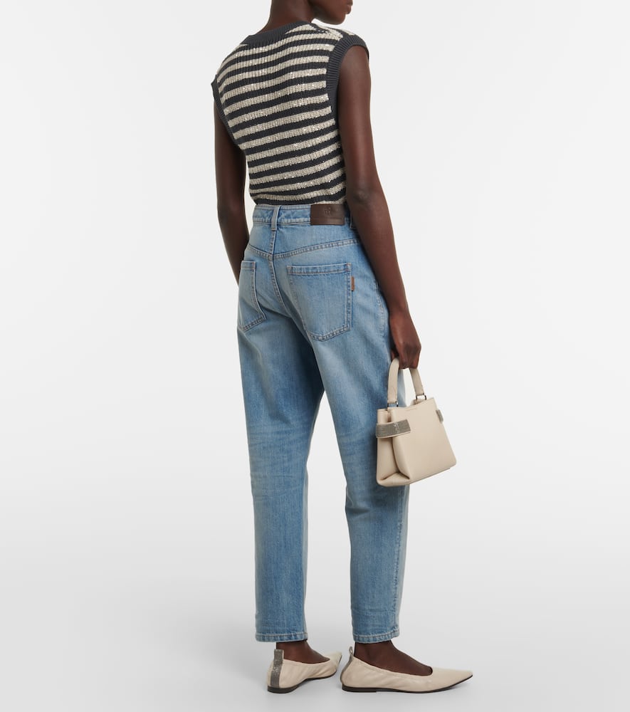 Mid-rise faded tapered jeans