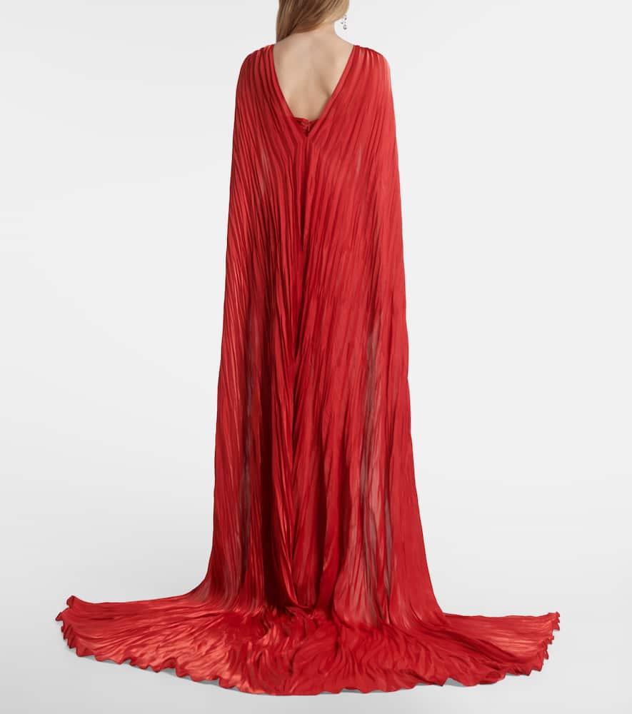Caped pleated bustier gown