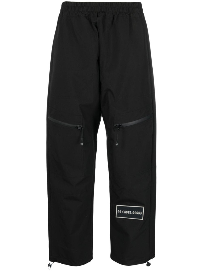 Logo-patch straight-leg trousers - Black