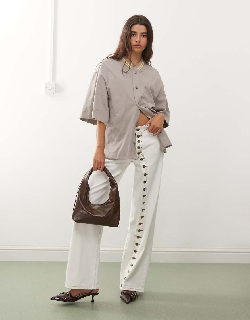Penny asymmetric button detail wide leg jeans in white