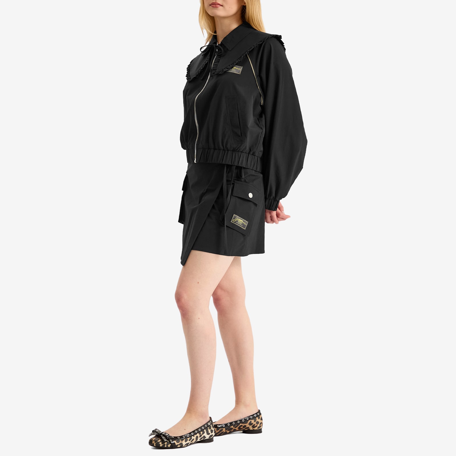 GANNI Women's Stretch Shell Wrap Mini Skirt Presented by END. in Black